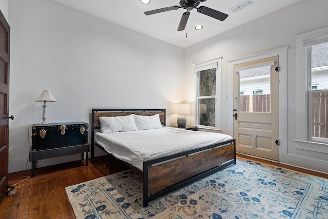 bedroom featuring dark hardwood / wood-style floors and ceiling fan