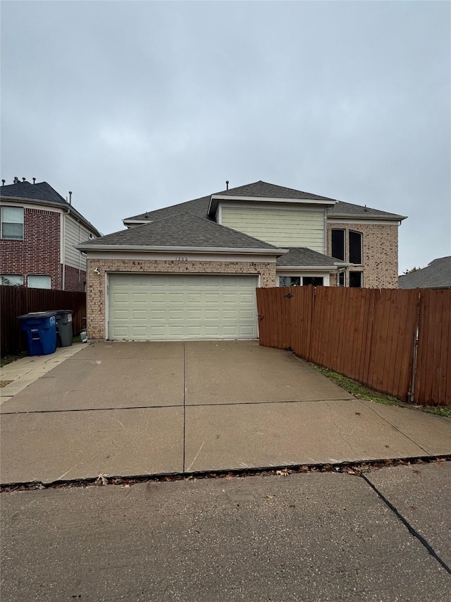 view of front of home with a garage