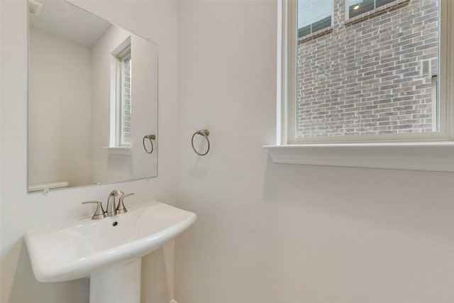 bathroom with sink and a wealth of natural light