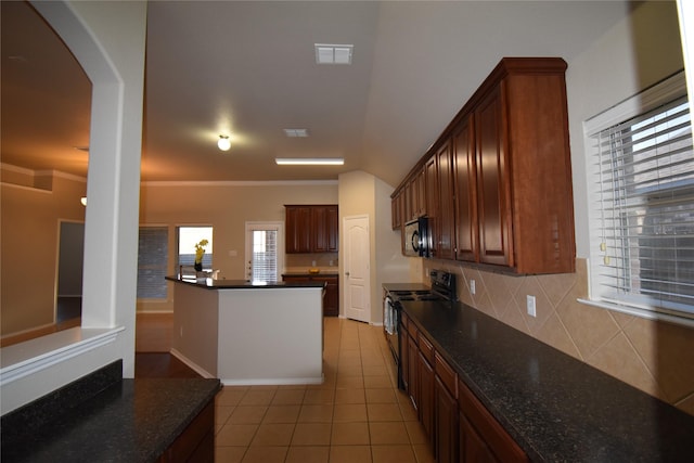 kitchen featuring ornamental molding, light tile patterned floors, decorative backsplash, and black appliances