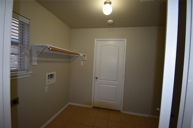 washroom with light tile patterned flooring, washer hookup, and electric dryer hookup