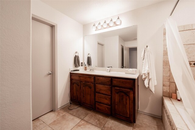 bathroom with vanity and tile patterned floors