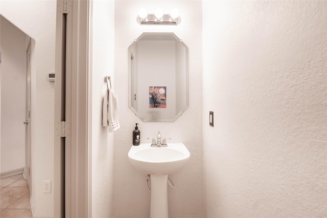 bathroom featuring tile patterned flooring