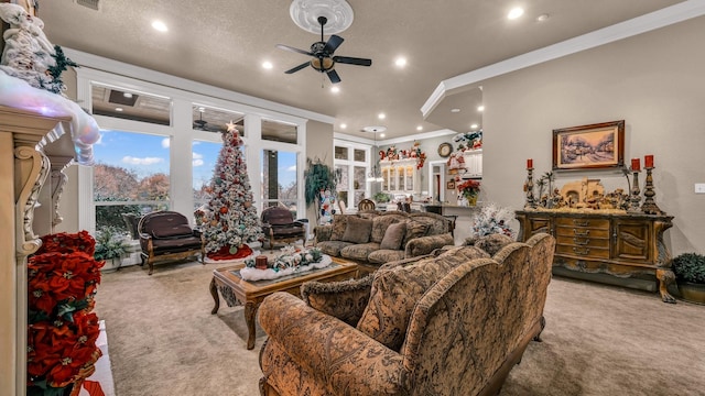 carpeted living room with ceiling fan, french doors, a textured ceiling, and ornamental molding