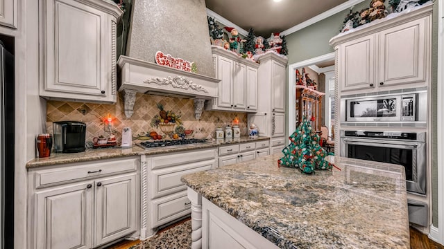 kitchen featuring custom exhaust hood, backsplash, dark wood-type flooring, light stone counters, and stainless steel appliances