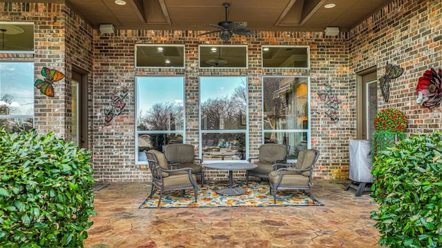 view of patio / terrace featuring ceiling fan