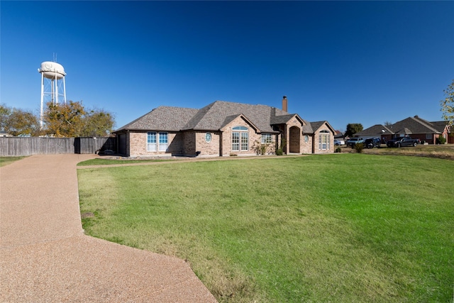 view of front of home with a front lawn