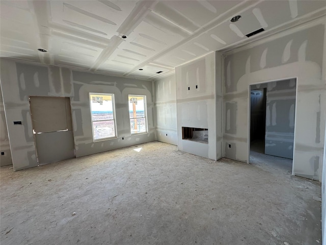 unfurnished living room featuring a fireplace