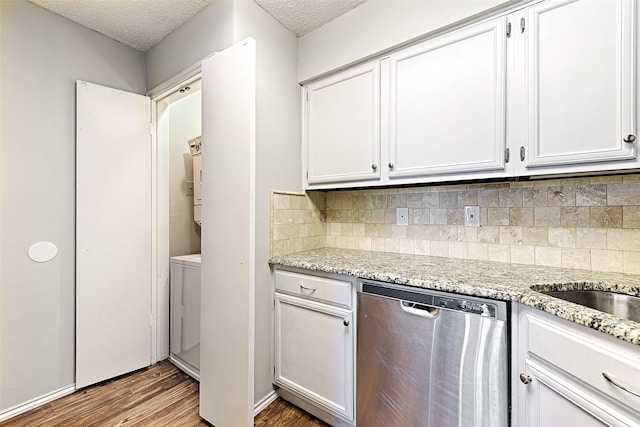 kitchen featuring white cabinetry, wood-type flooring, and dishwasher