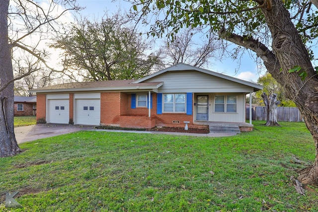 view of front facade with a garage and a front yard