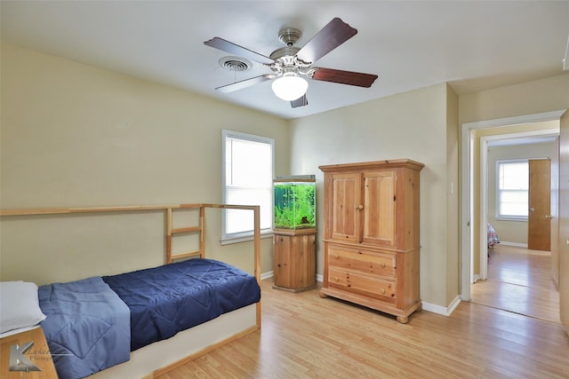 bedroom featuring ceiling fan and light wood-type flooring