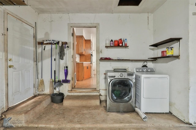 laundry area with washer and clothes dryer