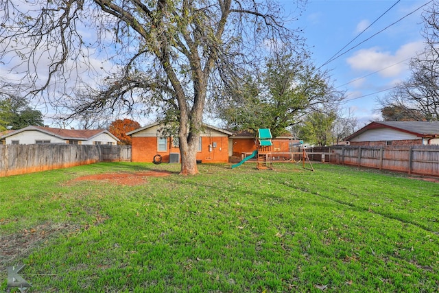 view of yard featuring a playground