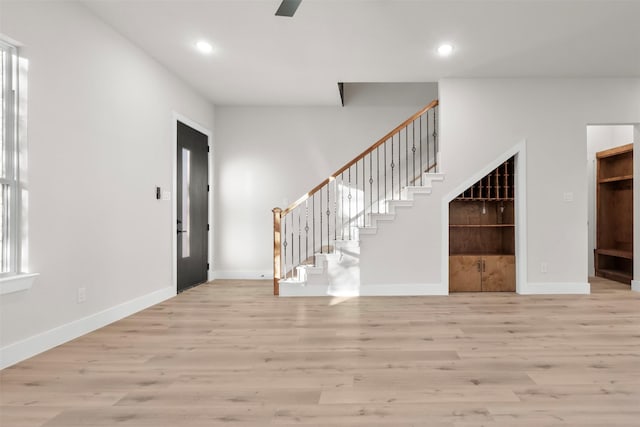 entryway with light hardwood / wood-style floors and a wealth of natural light