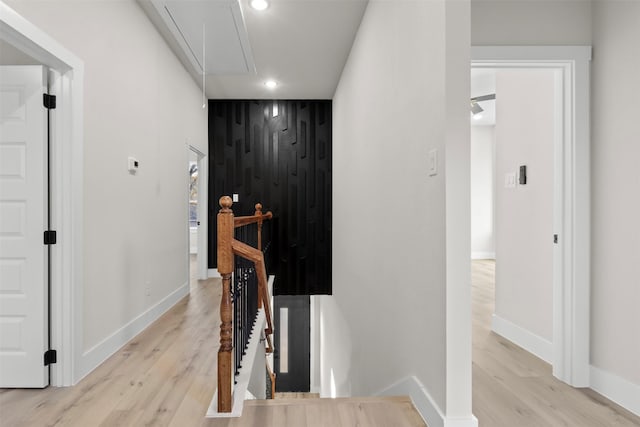 corridor with light wood-type flooring