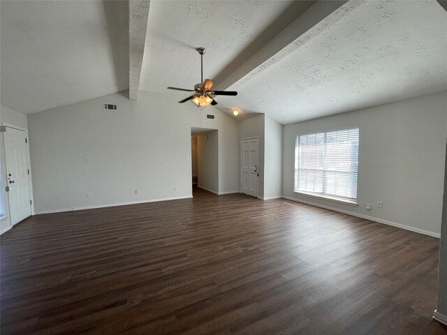 unfurnished living room with a textured ceiling, vaulted ceiling with beams, ceiling fan, and dark hardwood / wood-style floors