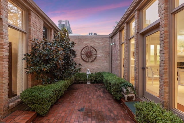 view of patio terrace at dusk