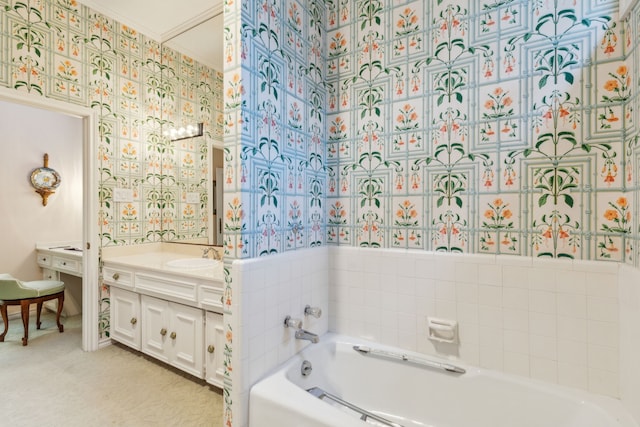 bathroom featuring a bathing tub and vanity