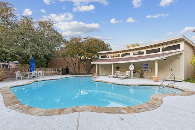 view of pool with a patio