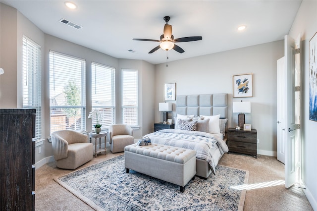 carpeted bedroom with ceiling fan