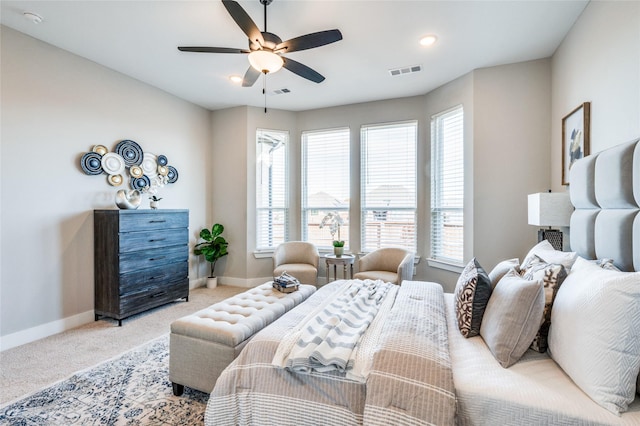 carpeted bedroom featuring ceiling fan