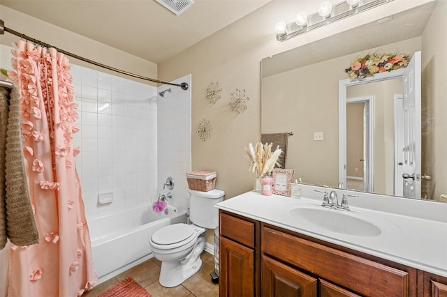 full bathroom with tile patterned flooring, shower / bath combo, toilet, and vanity