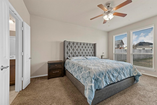 bedroom with ceiling fan and carpet