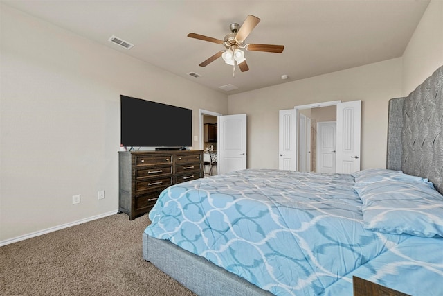 bedroom with ceiling fan and light carpet