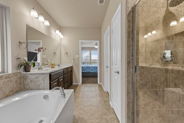 bathroom with vanity, tile patterned floors, ceiling fan, and independent shower and bath