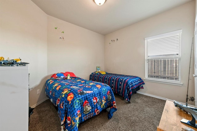 bedroom with dark carpet