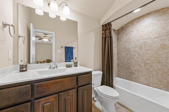 full bathroom with vanity, shower / tub combo with curtain, ceiling fan, toilet, and lofted ceiling