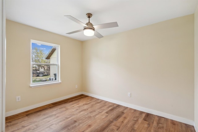 unfurnished room featuring ceiling fan and light hardwood / wood-style flooring