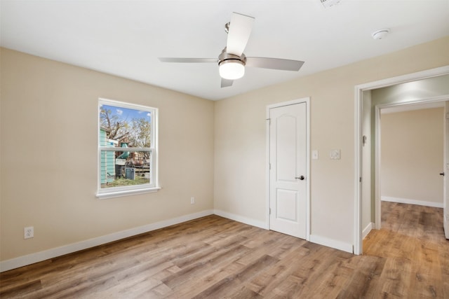 unfurnished bedroom with ceiling fan and light hardwood / wood-style floors