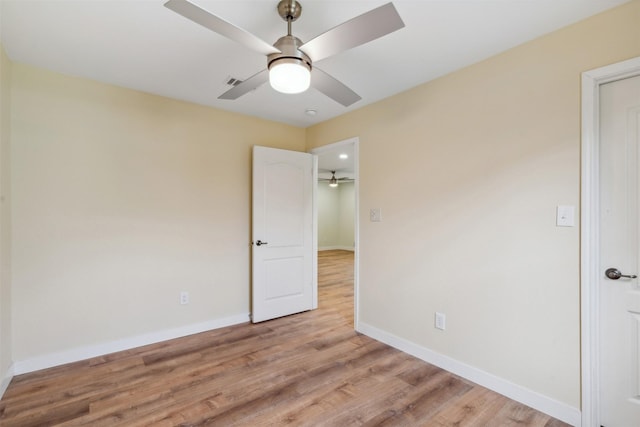 empty room with light hardwood / wood-style floors