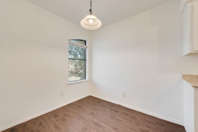 interior space featuring dark hardwood / wood-style flooring