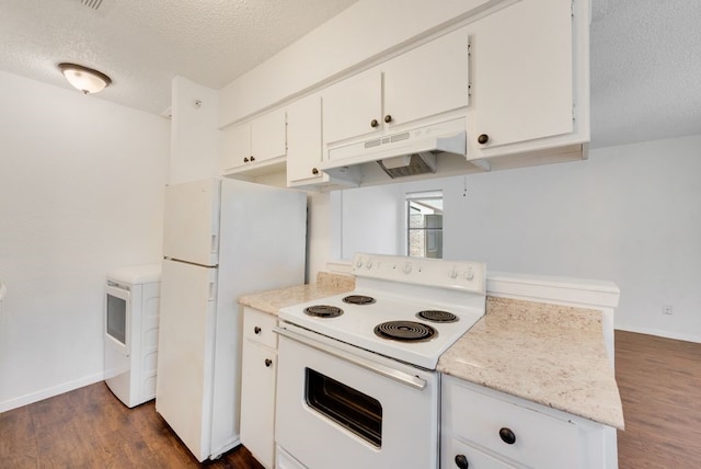 kitchen with a textured ceiling, white appliances, washer / clothes dryer, and white cabinetry