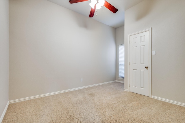 unfurnished room featuring carpet and ceiling fan