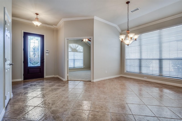 foyer featuring a notable chandelier and ornamental molding