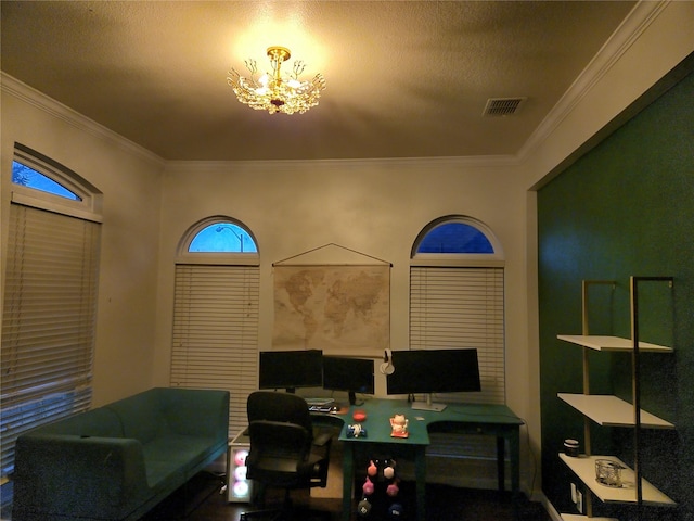 office area with a textured ceiling, crown molding, and a notable chandelier