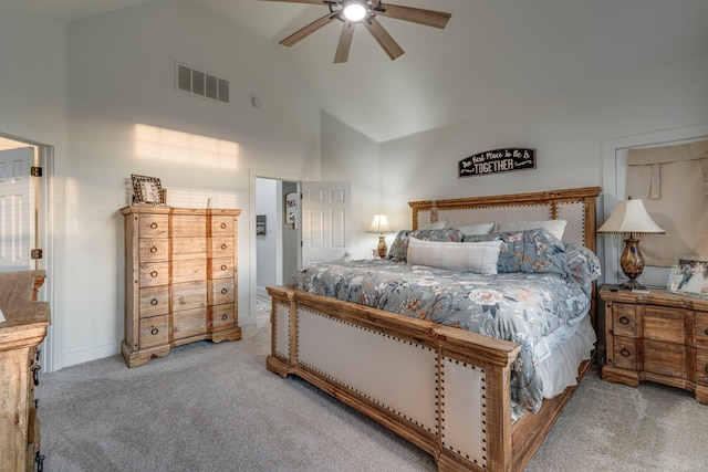 carpeted bedroom featuring high vaulted ceiling and ceiling fan