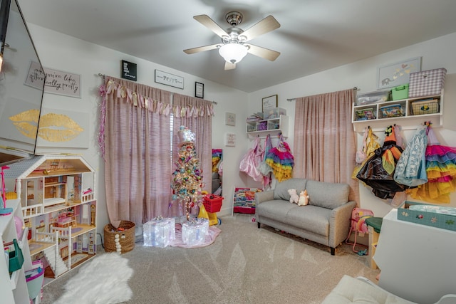 game room featuring carpet flooring and ceiling fan