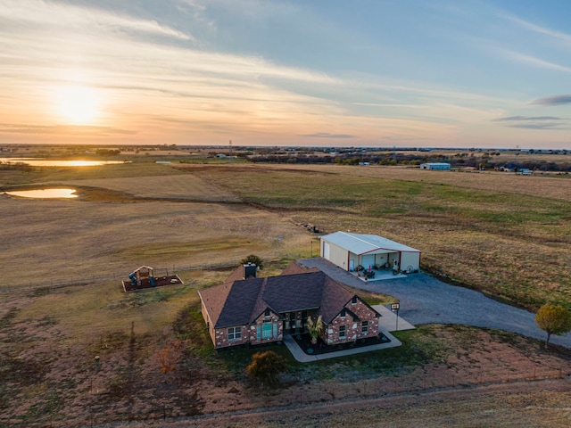 aerial view at dusk with a rural view