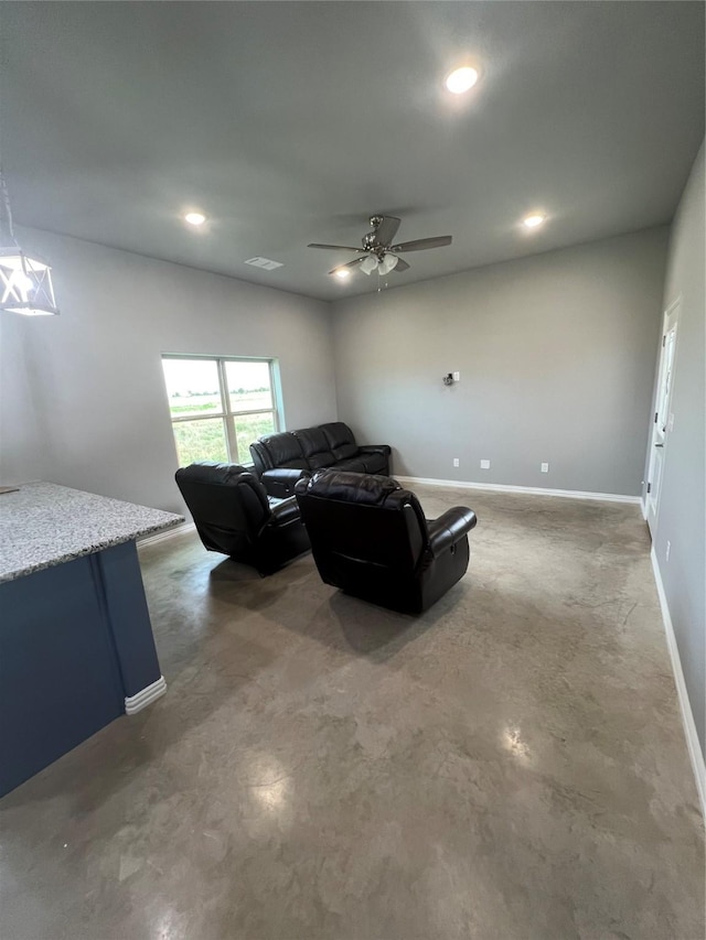 living room featuring ceiling fan