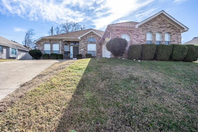 ranch-style home with a front lawn