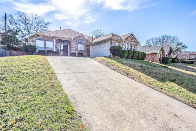 ranch-style home with a front yard and a garage