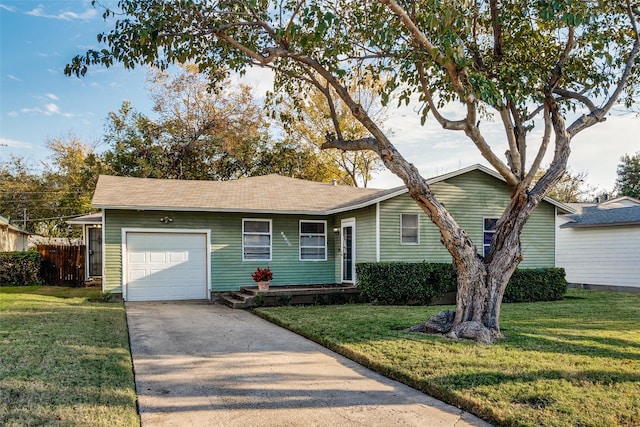 single story home with a front lawn and a garage