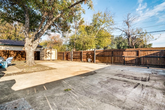 view of patio / terrace with a storage shed