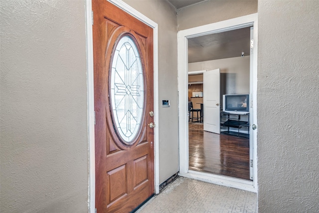 entrance foyer with light hardwood / wood-style floors