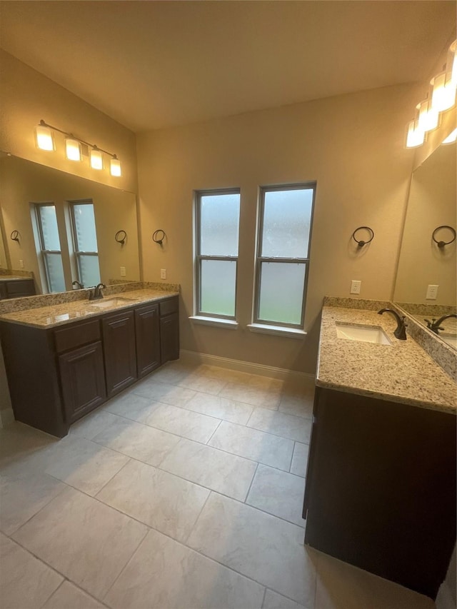 bathroom with vanity and tile patterned floors