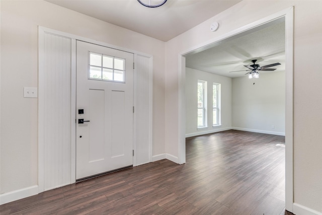 entryway featuring ceiling fan and dark hardwood / wood-style flooring